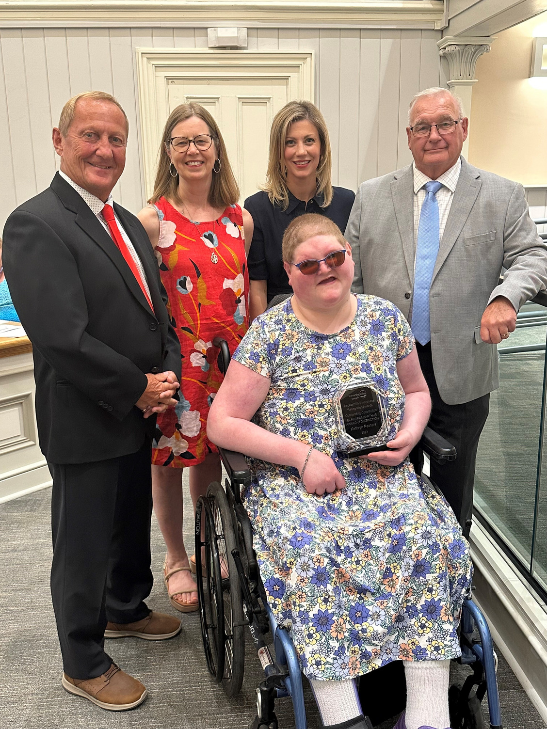 Kathryn Peeters accepting accessibility awareness award