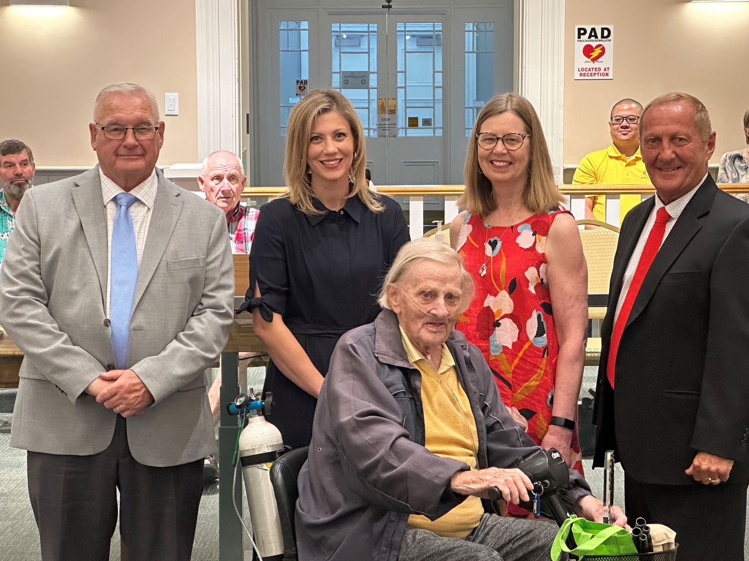 Norm Price accepting accessibility awareness award