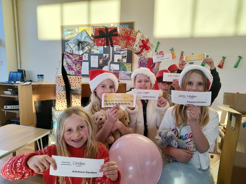 All aboard! Housebuilder sponsors Polar Express-themed Christmas fair at school in Crowborough