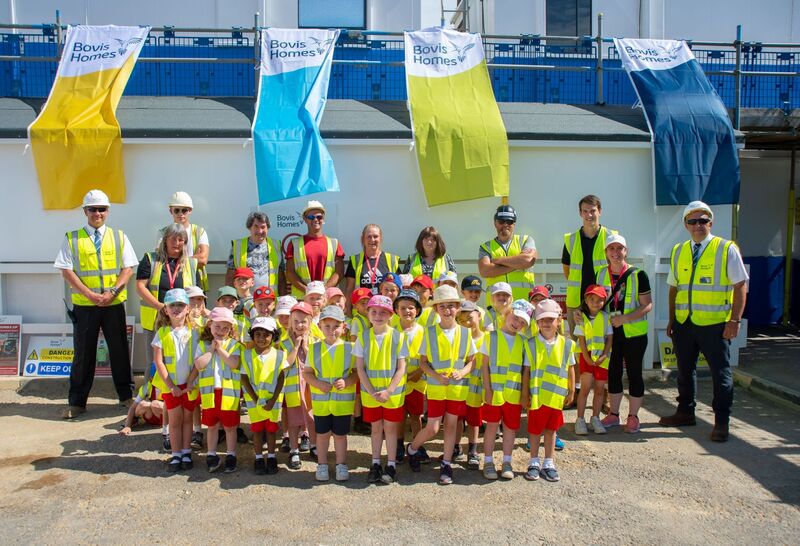 Primary school children visit new homes under construction in Bexhill
