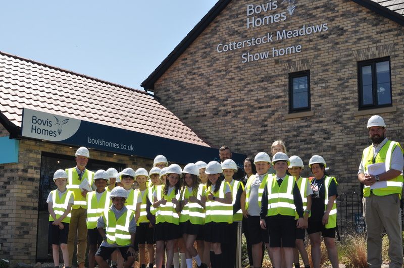 Bovis Homes helps prepare the way for school’s new playground equipment