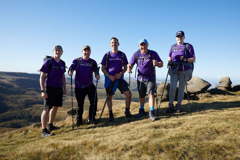 Staff from Caterham-based housebuilder complete Peak District challenge to raise money for youth charity