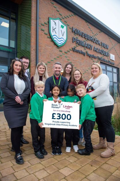 Housebuilder donates £300 towards primary school’s Christmas Fayre