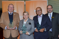 Left to right are: John Corrou ’94, Erin Sullivan ’04, ’13, Emad Rahim ’02, ’03, the 2018 recipients of the Distinguished Leader, Emerging Leader and Community Impact Award, and Officer in Charge Mitchell S. Nesler.