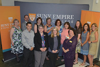 Image: Faculty and staff of the SUNY Empire State College School of Nursing and Allied Health gather for a photograph during the 10th anniversary of the nursing program.