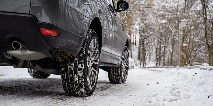 car parked on snowy road