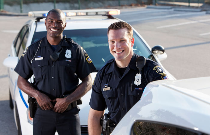 Two law enforcement officers posing for a picture