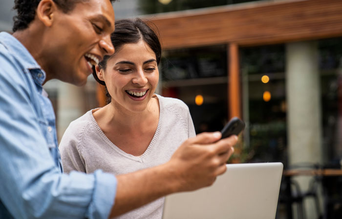 People looking at a phone