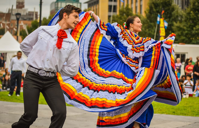 ballet folklorico dancers in a parade