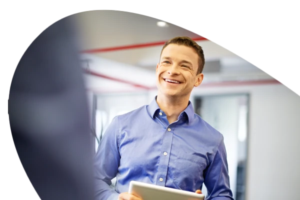 A person in an office smiling