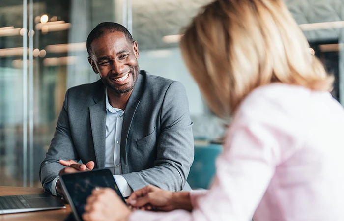 Two people working in an office
