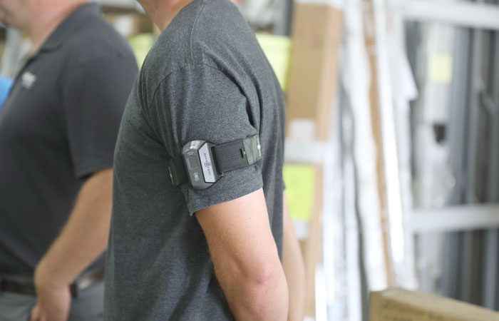 Close up of a mans wearable tech armband