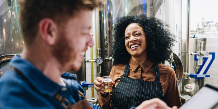 Man and woman in brewery