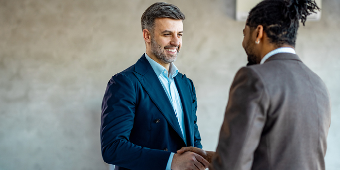 two men shaking hands