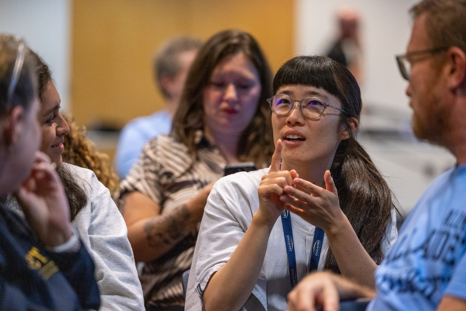 Two students communicating in American Sign Language