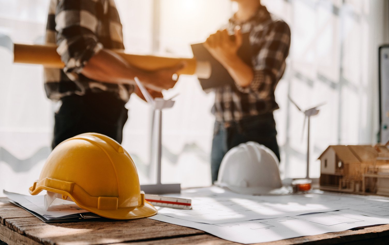 Construction workers discussing project plans