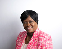 Marline Laurent Nicolas smiling