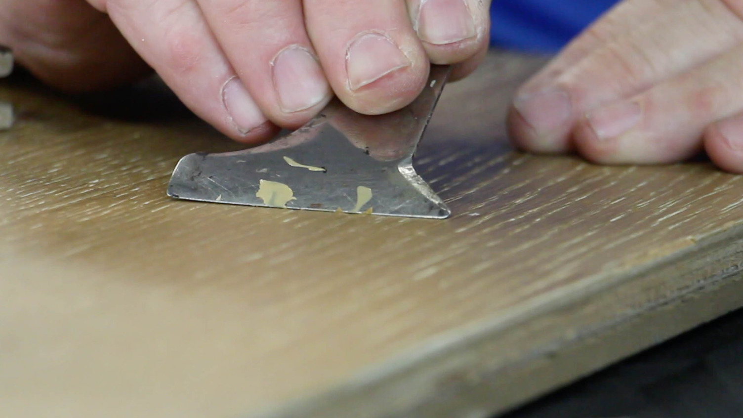 repairing wood floor with wax