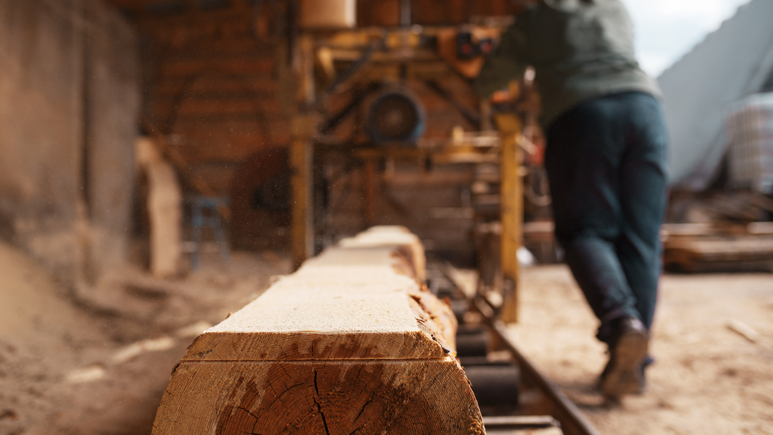 Man milling lumber