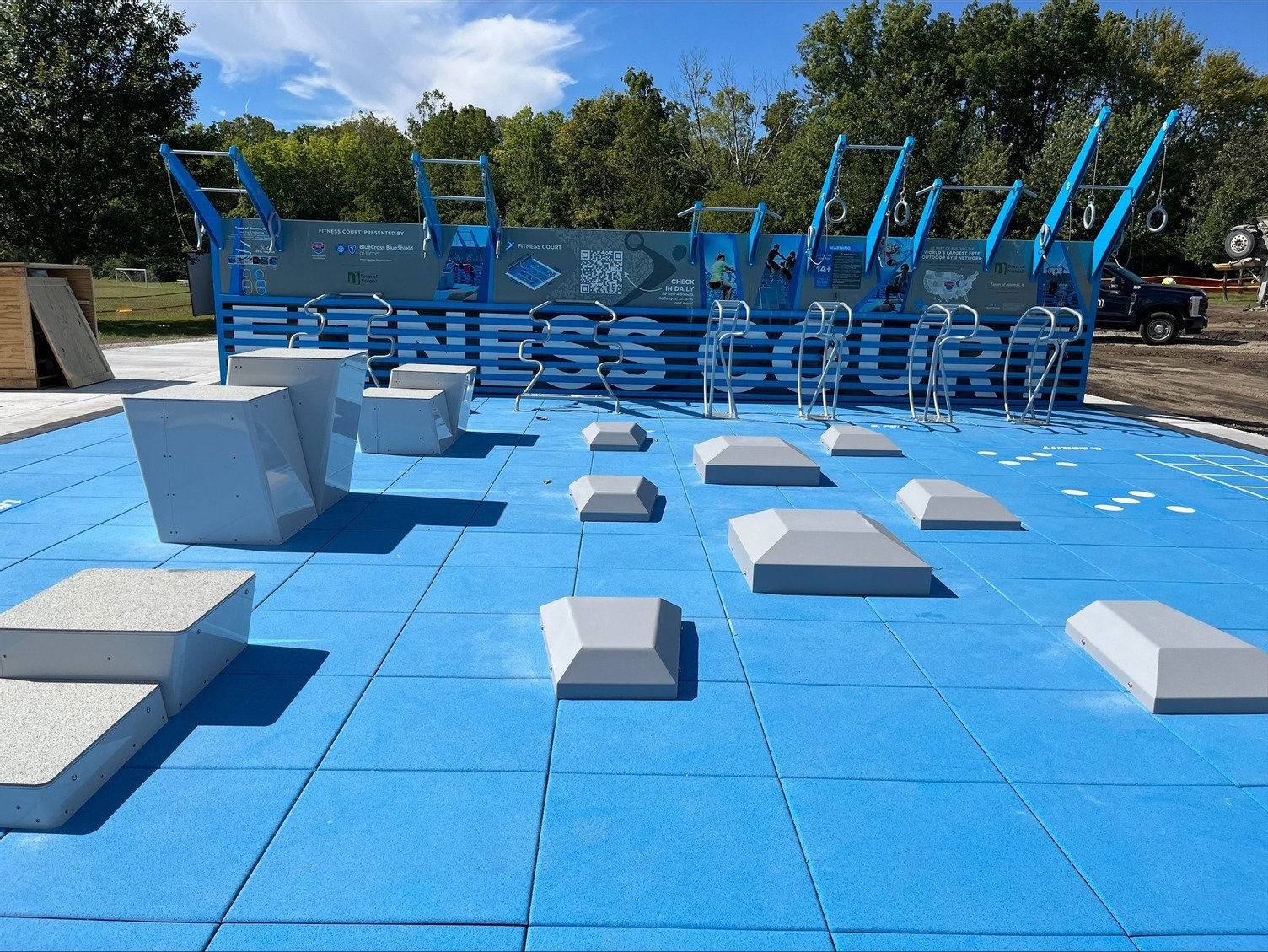 A fitness court with platforms for working out