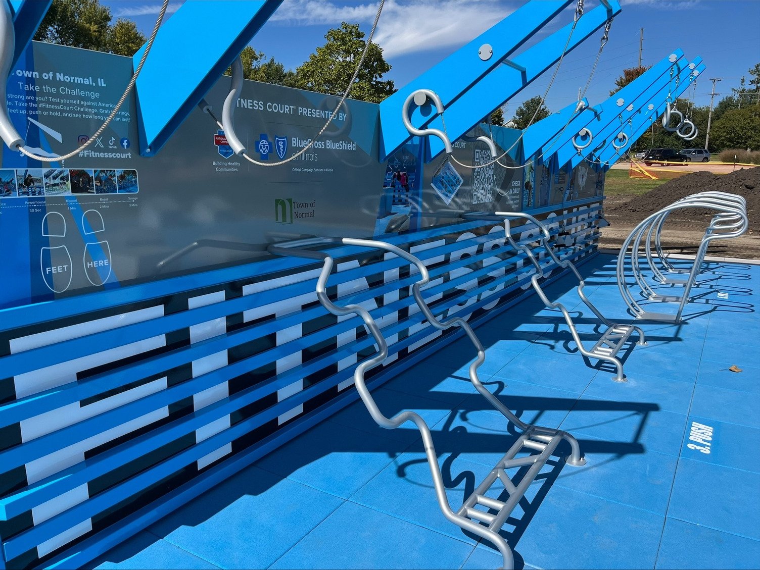 A fitness court with apparatus for working out. 