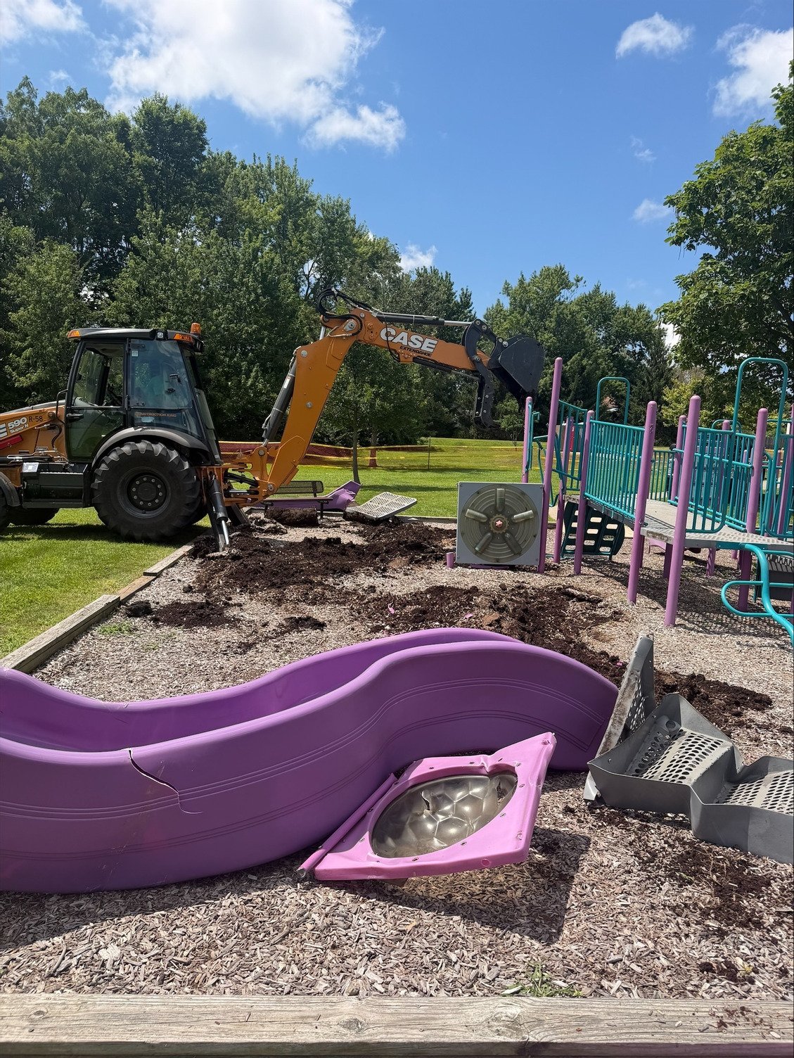 The playground at Rosa Parks Commons being demolished